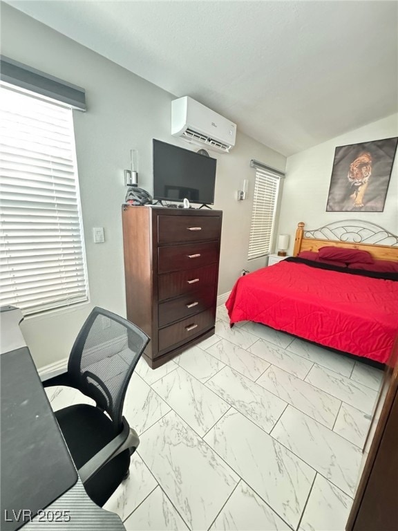 1505 Lilac Breeze Cir, Las Vegas, NV 89108 - bedroom featuring an AC wall unit, light marble finish flooring, an office area, and baseboards