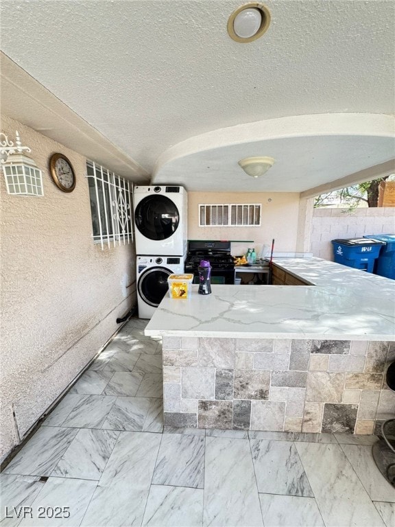 1505 Lilac Breeze Cir, Las Vegas, NV 89108 - view of patio with stacked washer / drying machine