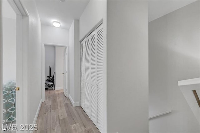 6320 Desert Leaf St Unit 101, North Las Vegas, NV 89081 - hall featuring wood finished floors and baseboards