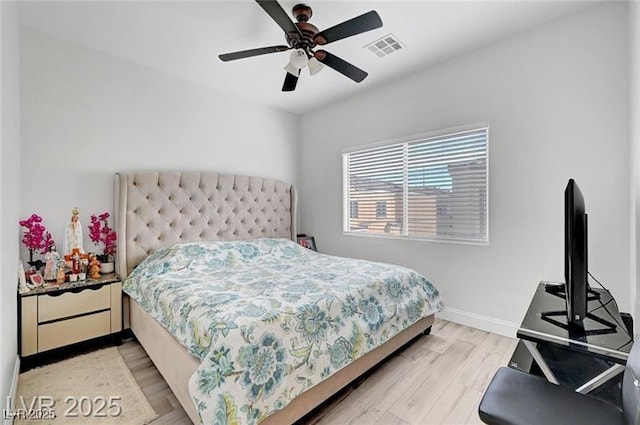 6320 Desert Leaf St Unit 101, North Las Vegas, NV 89081 - bedroom featuring light wood-style floors, baseboards, and ceiling fan