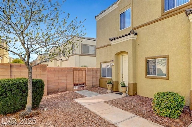 6320 Desert Leaf St Unit 101, North Las Vegas, NV 89081 - view of yard with a gate