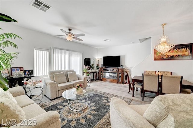 6320 Desert Leaf St Unit 101, North Las Vegas, NV 89081 - living room with a ceiling fan and light wood-style flooring