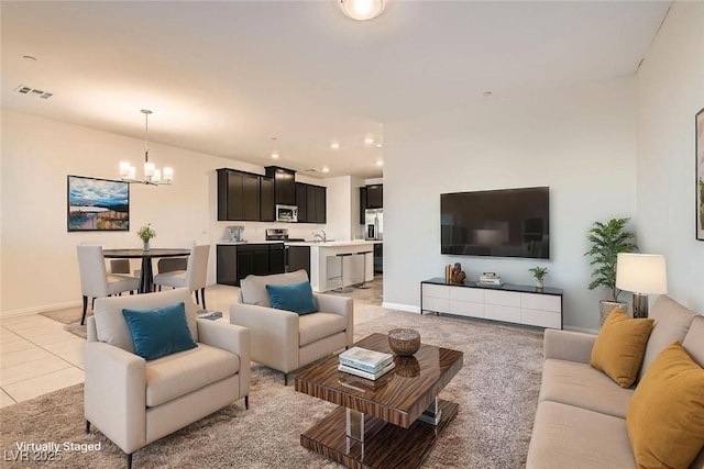 762 Star Estates Ave Unit 0, North Las Vegas, NV 89086 - living room featuring a chandelier, baseboards, light tile patterned flooring, and recessed lighting