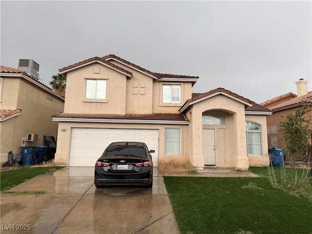 1749 Green Apple Way, Las Vegas, NV 89142 - traditional home with a garage, driveway, a tiled roof, and stucco siding