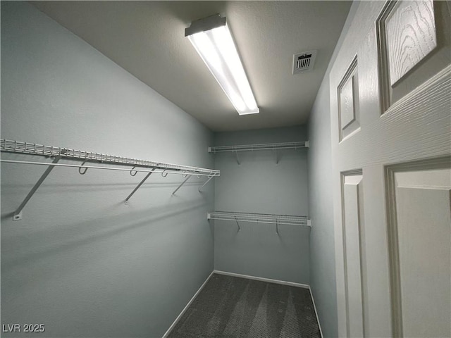 4749 Golden Shimmer Ave, Las Vegas, NV 89139 - spacious closet featuring carpet flooring