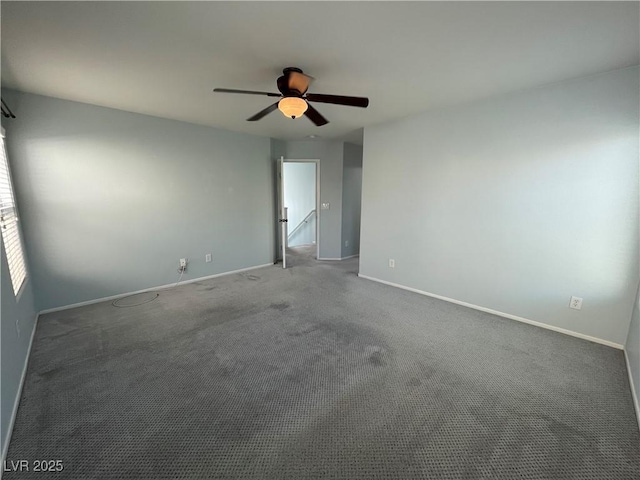 4749 Golden Shimmer Ave, Las Vegas, NV 89139 - spare room with ceiling fan, baseboards, and carpet flooring