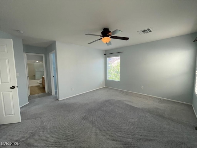4749 Golden Shimmer Ave, Las Vegas, NV 89139 - carpeted empty room featuring a ceiling fan, baseboards, and a smoke detector