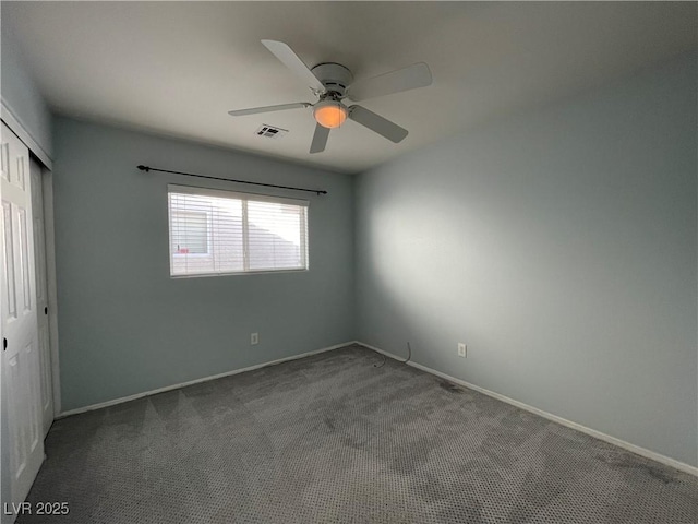 4749 Golden Shimmer Ave, Las Vegas, NV 89139 - unfurnished bedroom featuring a closet, carpet floors, baseboards, and ceiling fan