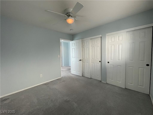 4749 Golden Shimmer Ave, Las Vegas, NV 89139 - unfurnished bedroom featuring carpet flooring, multiple closets, baseboards, and a ceiling fan