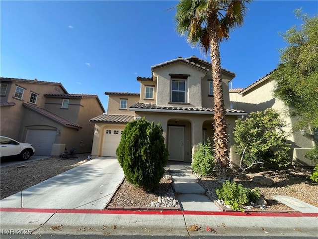 4749 Golden Shimmer Ave, Las Vegas, NV 89139 - mediterranean / spanish house featuring stucco siding, a tiled roof, concrete driveway, and a garage