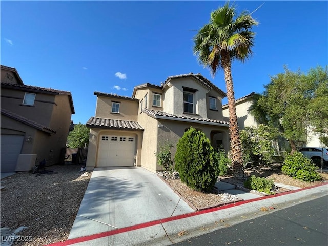 4749 Golden Shimmer Ave, Las Vegas, NV 89139 - mediterranean / spanish-style home with stucco siding, driveway, and a tile roof