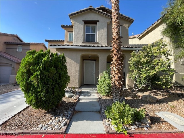 4749 Golden Shimmer Ave, Las Vegas, NV 89139 - mediterranean / spanish house with stucco siding and a tiled roof