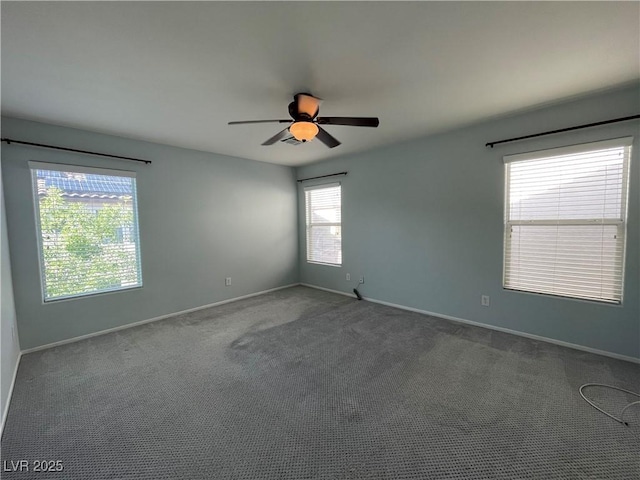 4749 Golden Shimmer Ave, Las Vegas, NV 89139 - carpeted spare room with baseboards and a ceiling fan