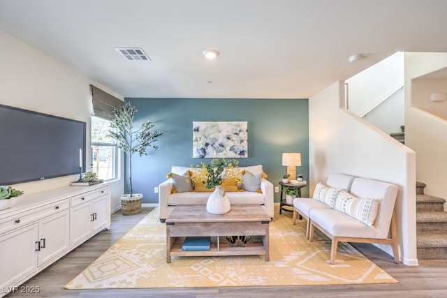 4972 Fern Mesa Ave Lot 133, Las Vegas, NV 89139 - living room with wood finished floors, stairway, and baseboards