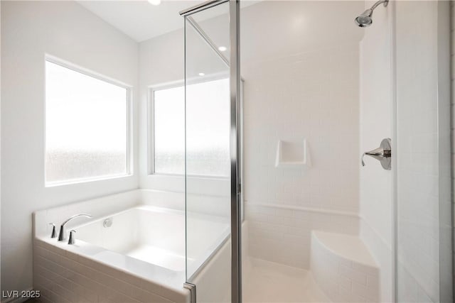 7002 Fossil Rim St, North Las Vegas, NV 89084 - full bath with a stall shower and a garden tub