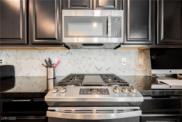 7002 Fossil Rim St, North Las Vegas, NV 89084 - kitchen featuring stainless steel appliances, decorative backsplash, and dark brown cabinets