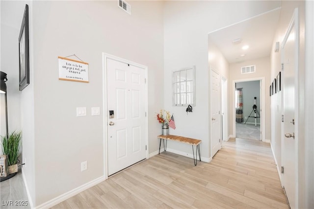 7002 Fossil Rim St, North Las Vegas, NV 89084 - foyer with light wood-style flooring and baseboards