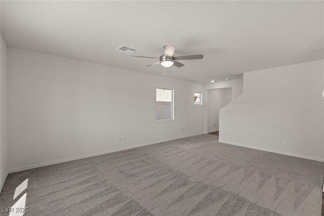 4940 Canna Lily St, Las Vegas, NV 89122 - empty room featuring ceiling fan, carpet floors, and baseboards