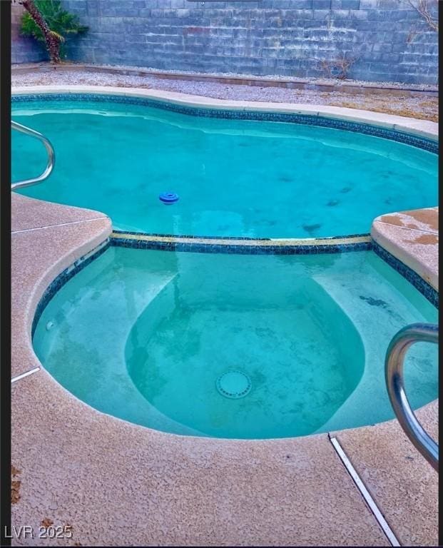 3729 La Junta Dr, Las Vegas, NV 89120 - view of swimming pool with a pool with connected hot tub