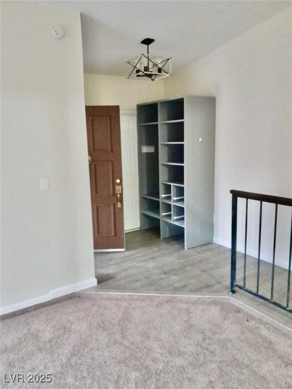 3729 La Junta Dr, Las Vegas, NV 89120 - unfurnished bedroom featuring carpet and a chandelier