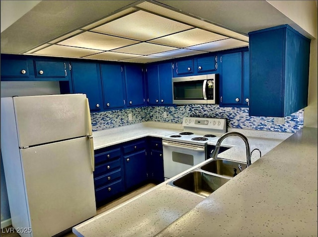 3729 La Junta Dr, Las Vegas, NV 89120 - kitchen featuring white appliances, blue cabinetry, and light countertops