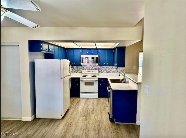 3729 La Junta Dr, Las Vegas, NV 89120 - kitchen featuring white appliances, blue cabinets, light wood-type flooring, light countertops, and ceiling fan