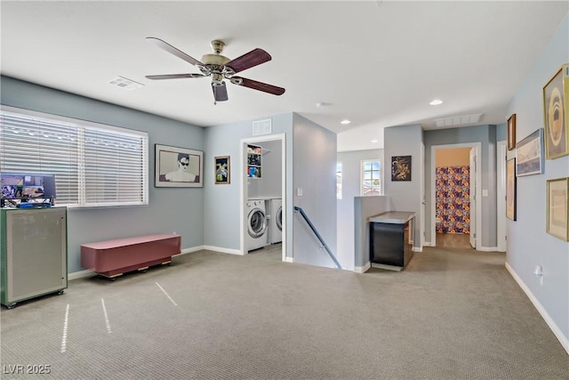 320 Point Loma Ave, North Las Vegas, NV 89031 - living area featuring washer and dryer, an upstairs landing, carpet flooring, baseboards, and recessed lighting