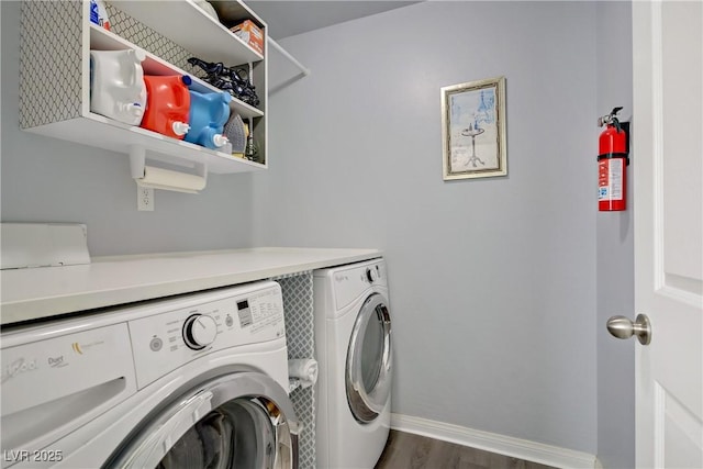 320 Point Loma Ave, North Las Vegas, NV 89031 - laundry room with washer and dryer, dark wood-type flooring, and baseboards