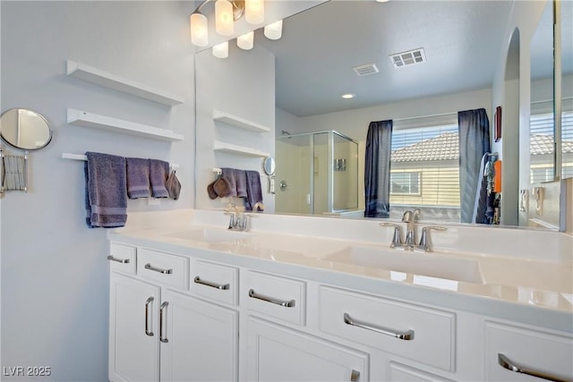 320 Point Loma Ave, North Las Vegas, NV 89031 - full bathroom with a stall shower and double vanity