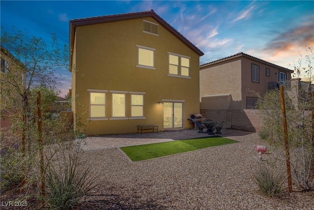 320 Point Loma Ave, North Las Vegas, NV 89031 - rear view of property with stucco siding and a patio