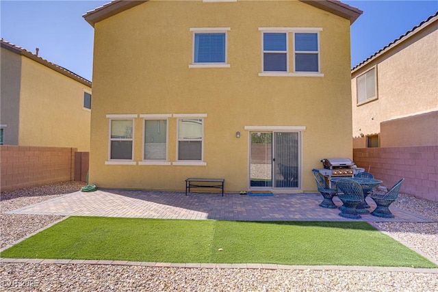 320 Point Loma Ave, North Las Vegas, NV 89031 - rear view of property with a patio area and stucco siding