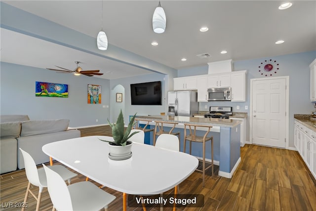 320 Point Loma Ave, North Las Vegas, NV 89031 - dining room featuring dark wood-type flooring, recessed lighting, ceiling fan, and baseboards