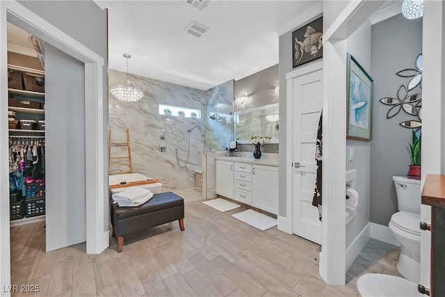 10484 Rose Park Ave, Las Vegas, NV 89135 - full bathroom with a marble finish shower, vanity, toilet, a chandelier, and wood finished floors