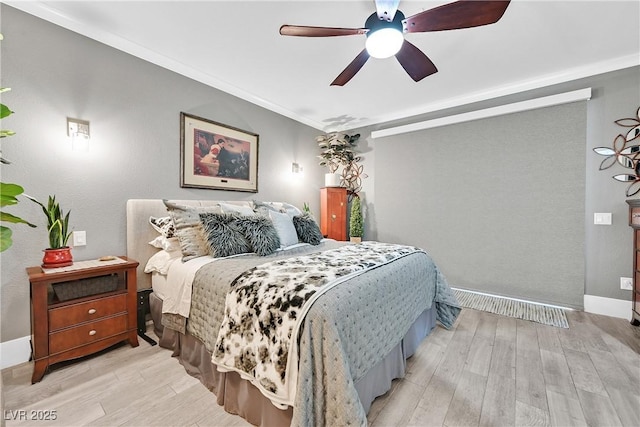 10484 Rose Park Ave, Las Vegas, NV 89135 - bedroom with light wood-style floors, a ceiling fan, baseboards, and ornamental molding