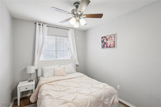 9333 Jumpin Juniper Ave, Las Vegas, NV 89129 - bedroom featuring baseboards, wood finished floors, and a ceiling fan