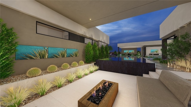 7047 Nomi Ct, Las Vegas, NV 89120 - view of patio / terrace with a fire pit