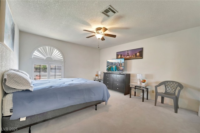5829 W Patrick Ln, Las Vegas, NV 89118 - carpeted bedroom with a textured ceiling and a ceiling fan