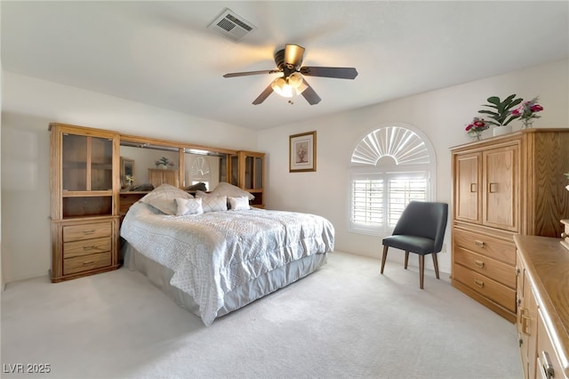 5829 W Patrick Ln, Las Vegas, NV 89118 - bedroom with light carpet and a ceiling fan
