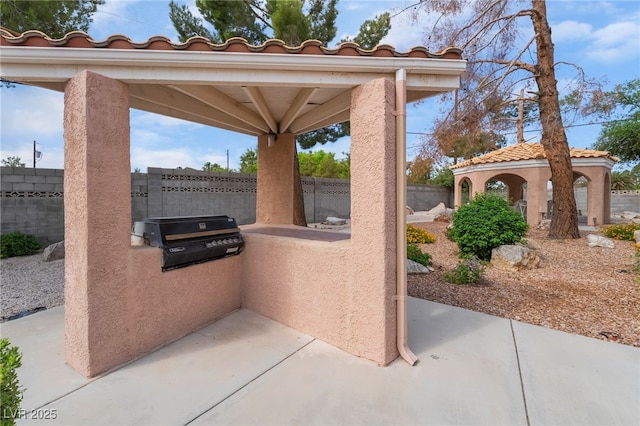 5829 W Patrick Ln, Las Vegas, NV 89118 - view of patio / terrace with a gazebo