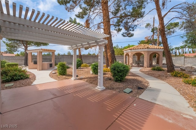 5829 W Patrick Ln, Las Vegas, NV 89118 - fenced backyard with a gazebo, a pergola, and a patio area