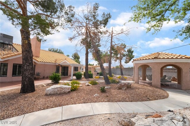 5829 W Patrick Ln, Las Vegas, NV 89118 - view of home's community featuring a patio area