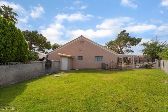 5829 W Patrick Ln, Las Vegas, NV 89118 - back of house with a gate and stucco siding