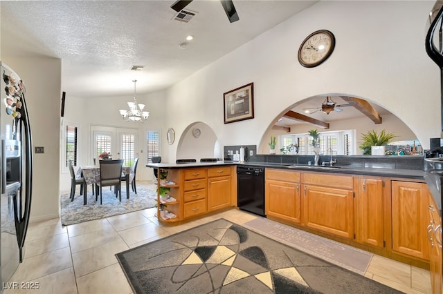 5829 W Patrick Ln, Las Vegas, NV 89118 - kitchen featuring a ceiling fan, black dishwasher, refrigerator with ice dispenser, a sink, and dark countertops
