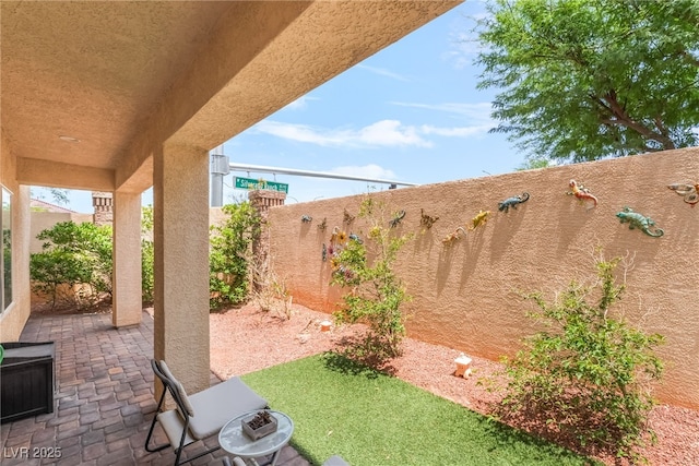 9704 Morgan Creek Ct, Las Vegas, NV 89141 - fenced backyard featuring a patio area