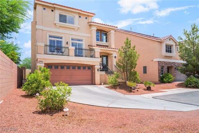 9704 Morgan Creek Ct, Las Vegas, NV 89141 - mediterranean / spanish home with stucco siding, driveway, a tiled roof, a garage, and a balcony