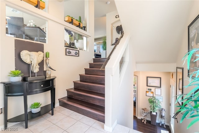 9704 Morgan Creek Ct, Las Vegas, NV 89141 - stairs featuring tile patterned flooring and baseboards