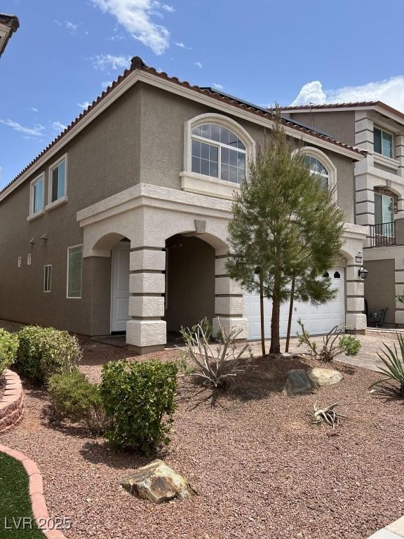 8116 Russell Creek Ct, Las Vegas, NV 89139 - view of front of home with stucco siding and a tile roof