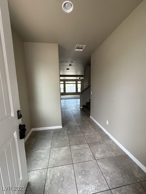 8116 Russell Creek Ct, Las Vegas, NV 89139 - hall with baseboards, tile patterned floors, and stairway