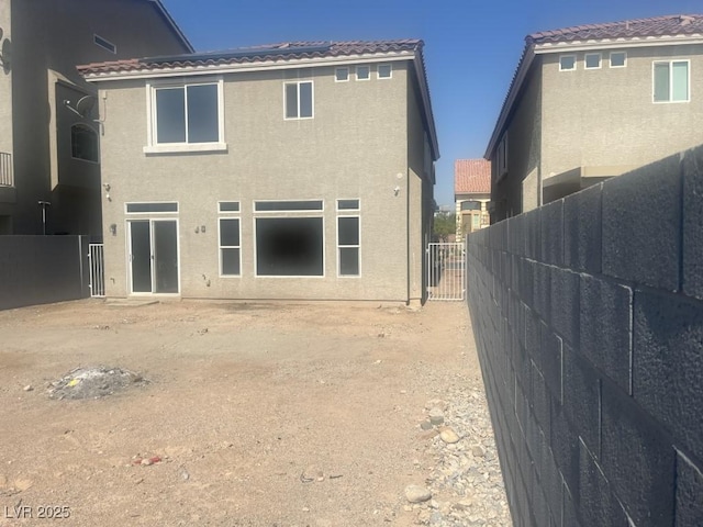 8116 Russell Creek Ct, Las Vegas, NV 89139 - back of house featuring stucco siding and a tile roof