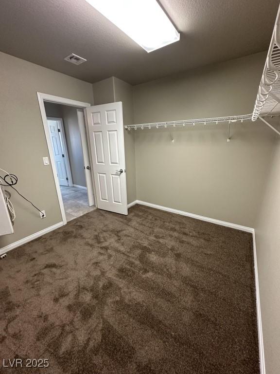 8116 Russell Creek Ct, Las Vegas, NV 89139 - spacious closet featuring carpet flooring